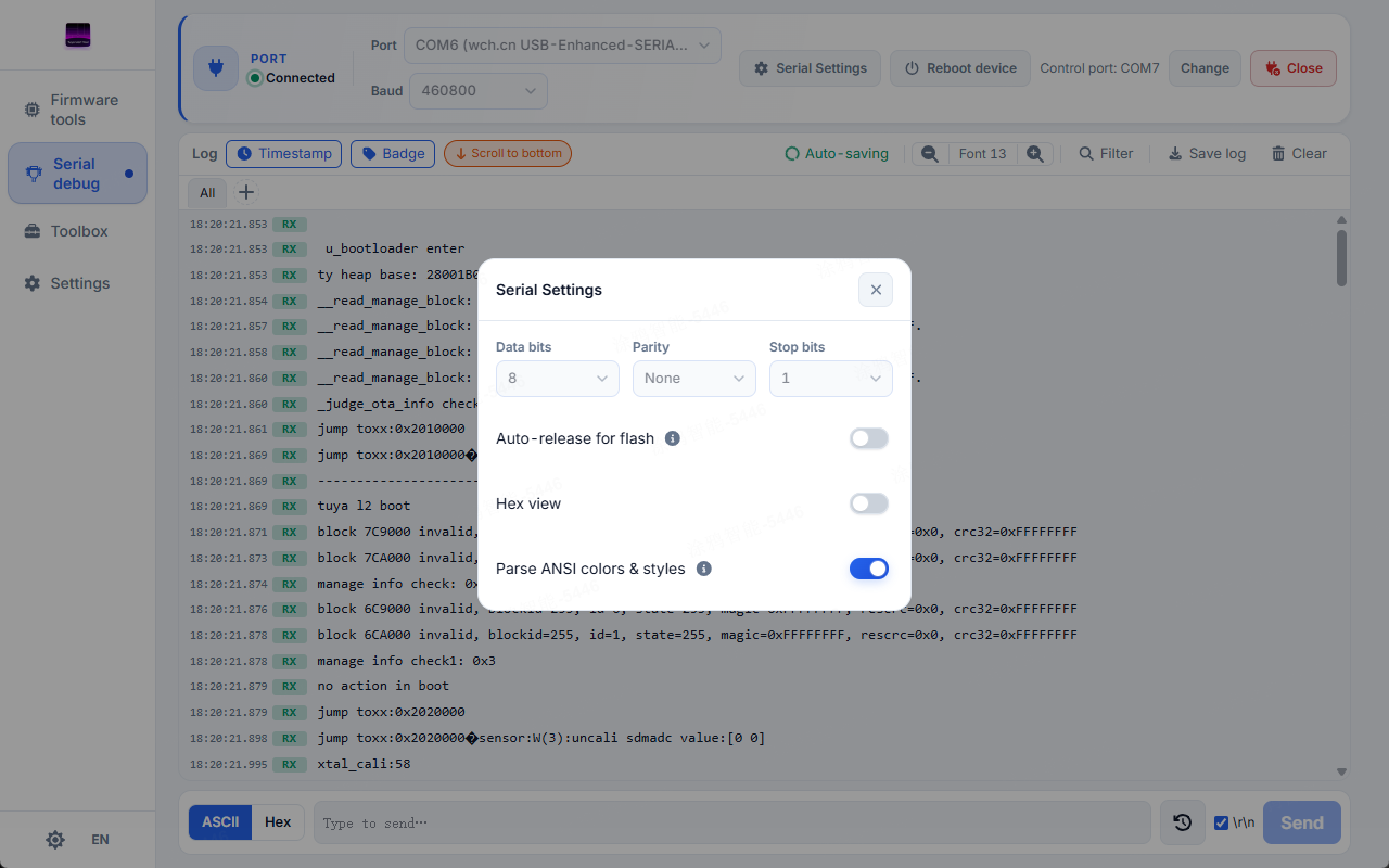 Log rows with RX badges and timestamps, with the Serial Settings dialog open — data bits, parity, stop bits, auto-release for flash, hex view, and ANSI color parsing